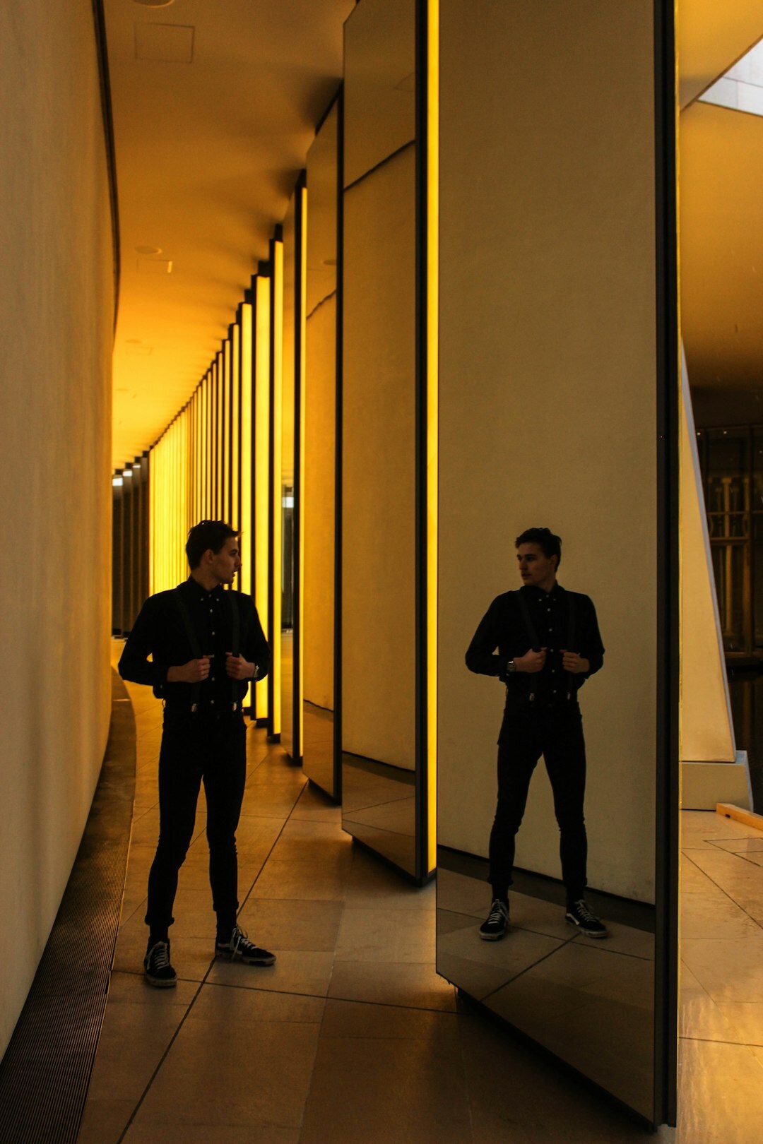 Man practicing a speech in front of a mirror