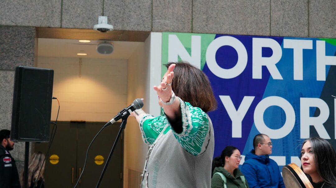 Woman giving a public speech to an audience