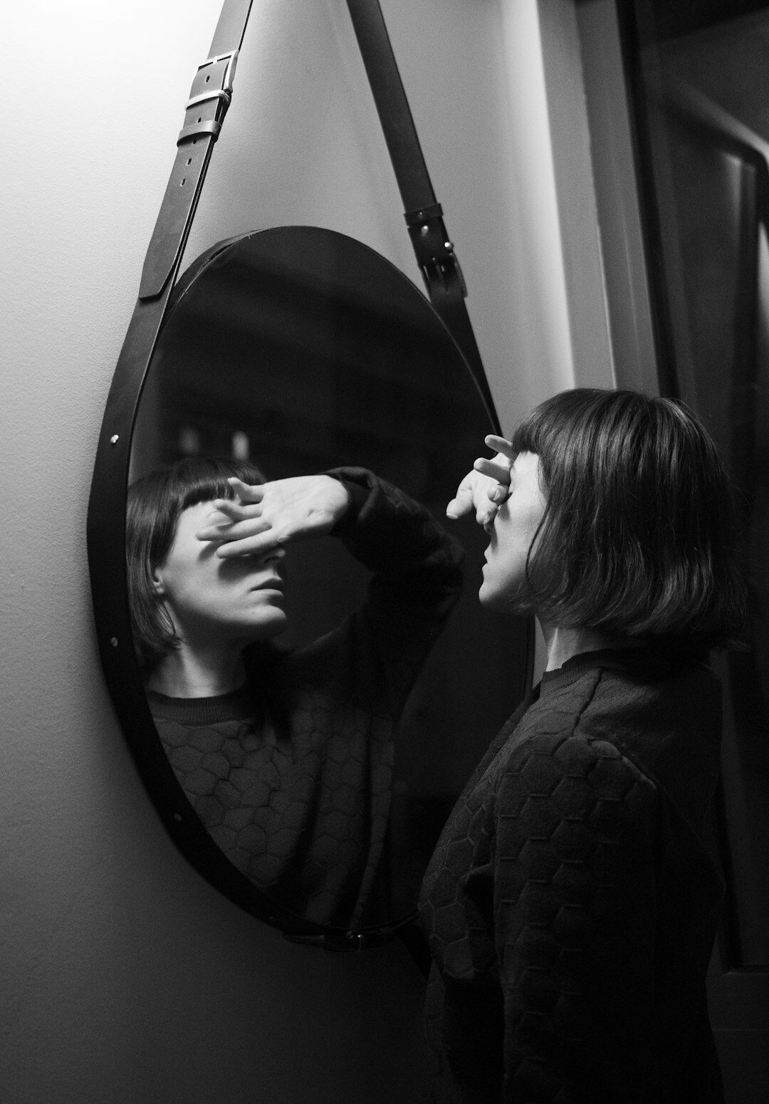 person practicing speech in mirror