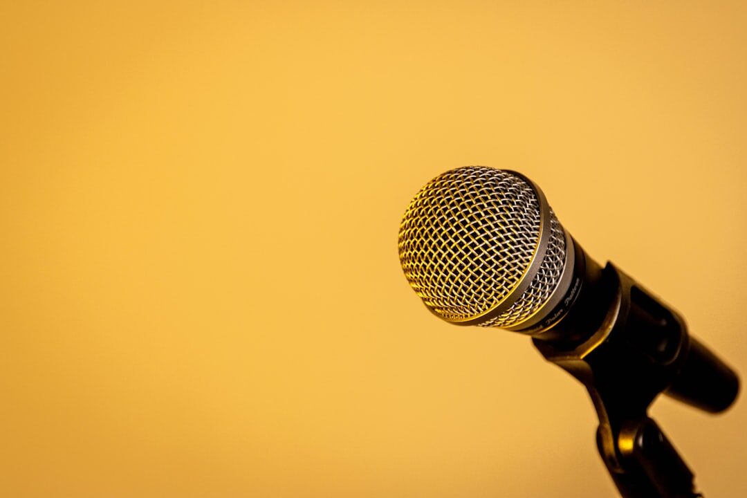 speaker on stage with microphone